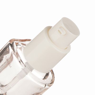 Flacon cosmétique en verre de forme irrégulière