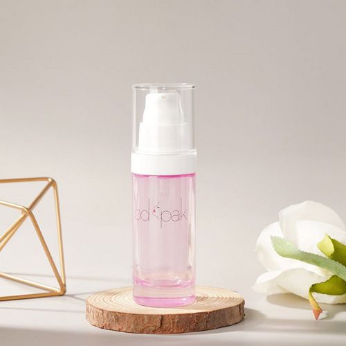 Flacon en verre rose avec bouchon transparent