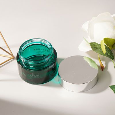 Pot de crème cosmétique en verre
