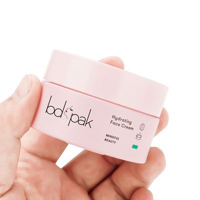 Pot de crème cosmétique en verre