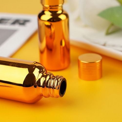 Flacon compte-goutte doré